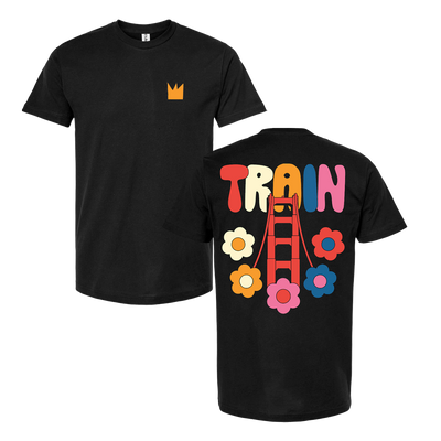 Black t-shirt with colorful ’TRAIN’ design and flower graphics on the back.