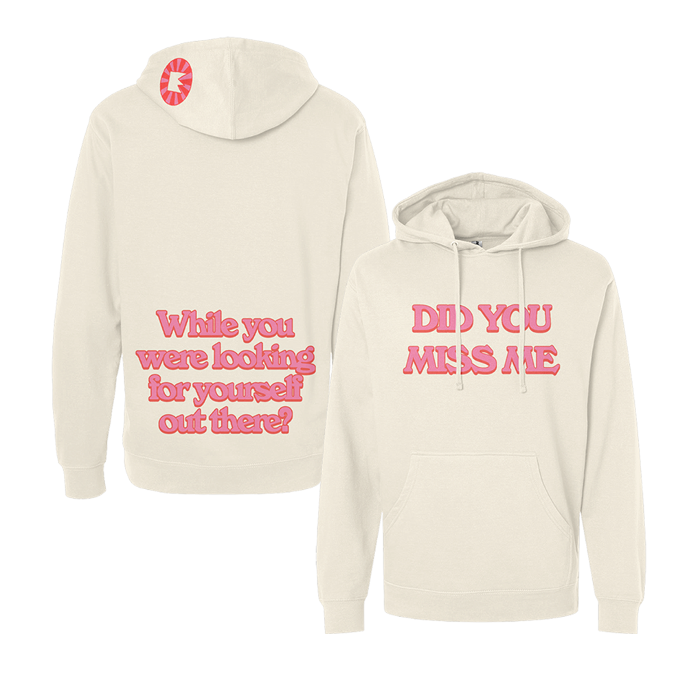 Two cream-colored hooded sweatshirts with pink text printed on them.