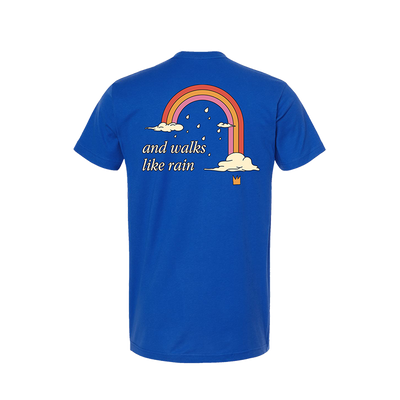 Blue t-shirt with a rainbow and cloud design featuring the text ’and walks like rain’.